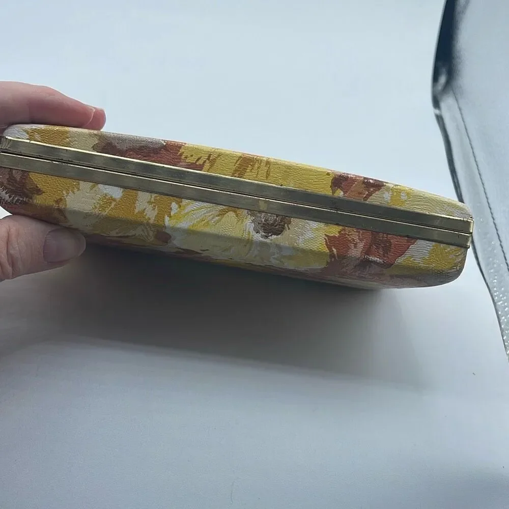 Vintage 70’s pierced earrings case. Golden rod floral print.
